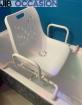 Chaise de douche se posant sur une...